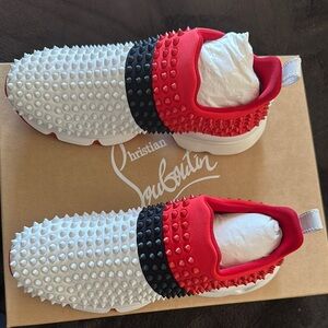Christian Louboutin Red, White, and Black Spiked Sneakers